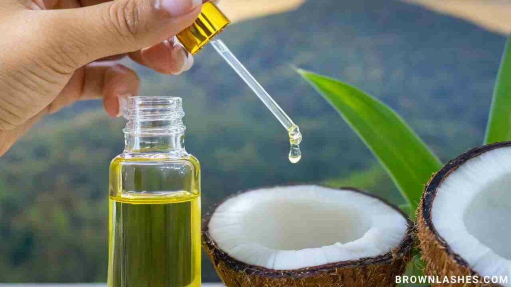 A close-up of a person applying oil to their eyelashes to prevent thinning.