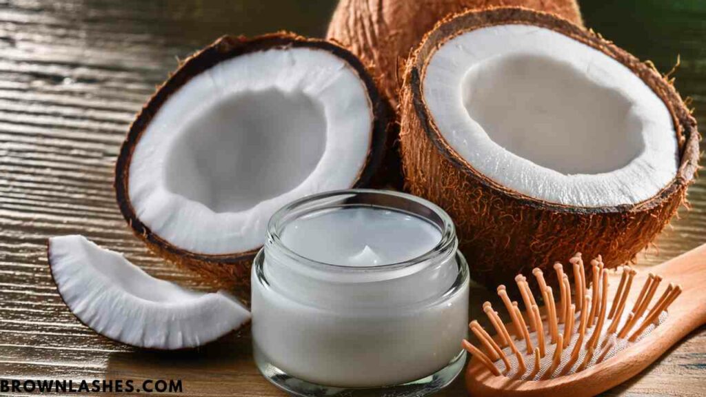 Close-up of eyelashes coated with coconut oil, highlighting their glossy and hydrated appearance.